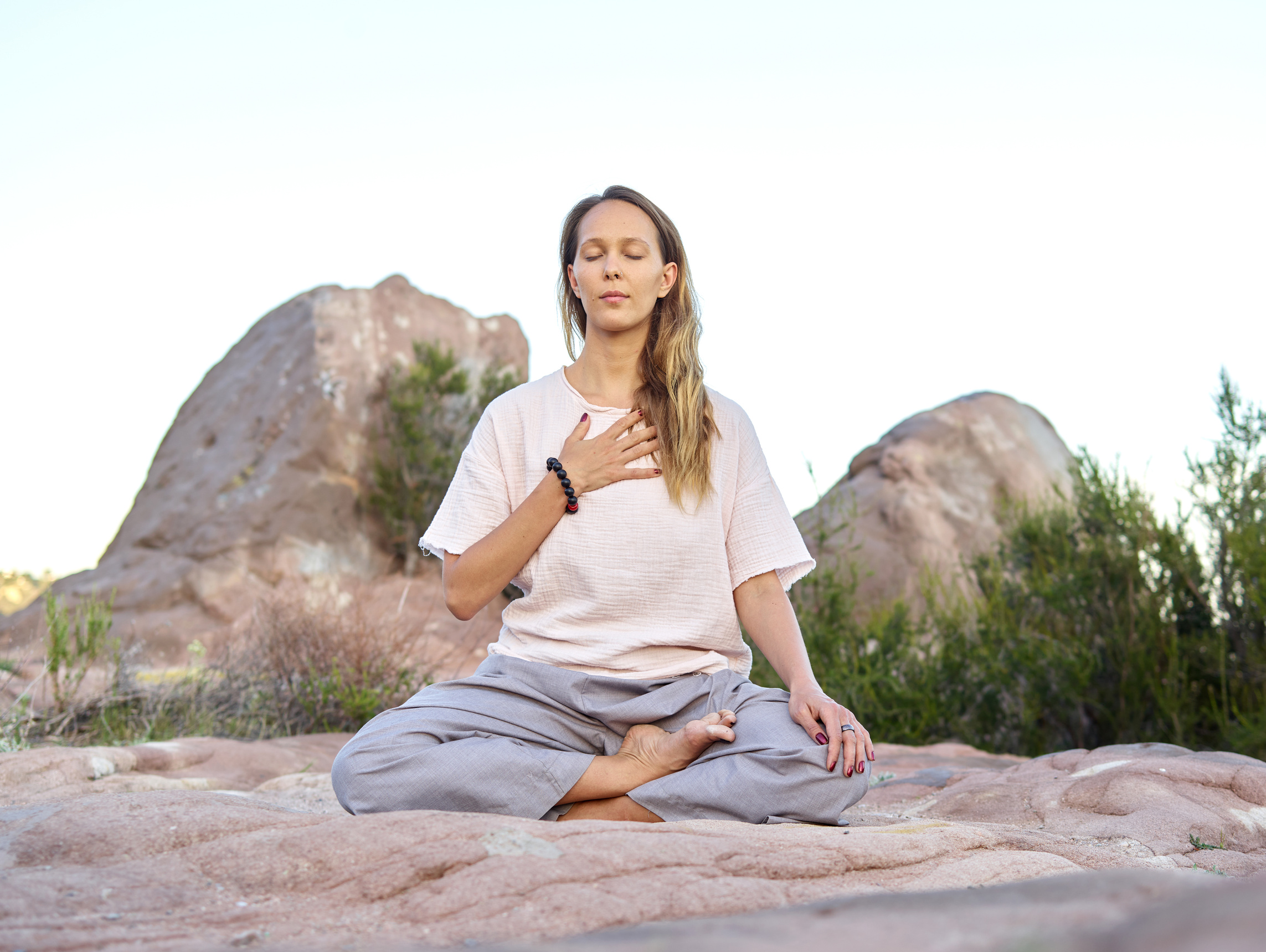 Woman Meditating with Her Eyes Closed